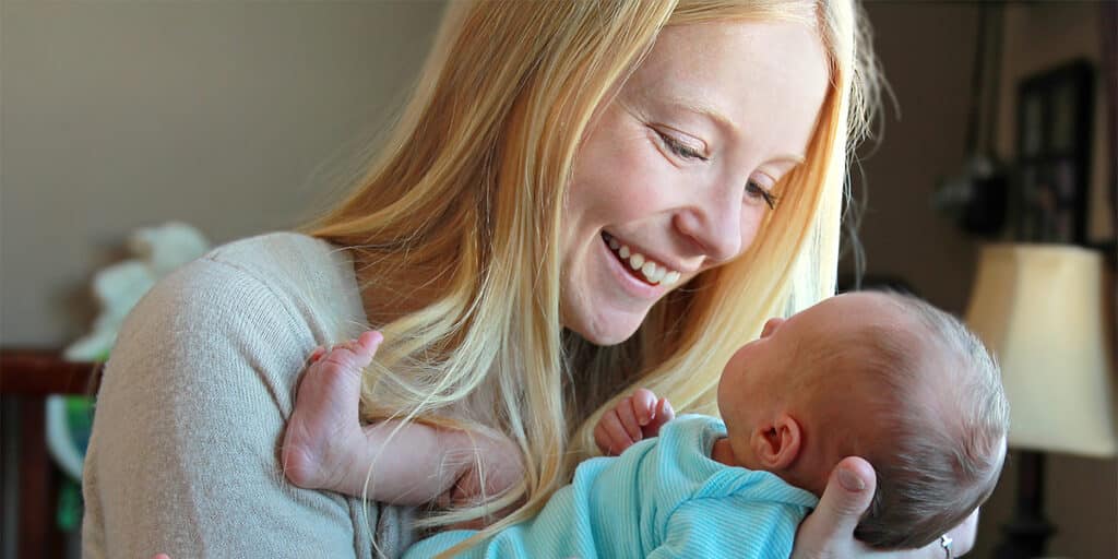 woman holding a newborn