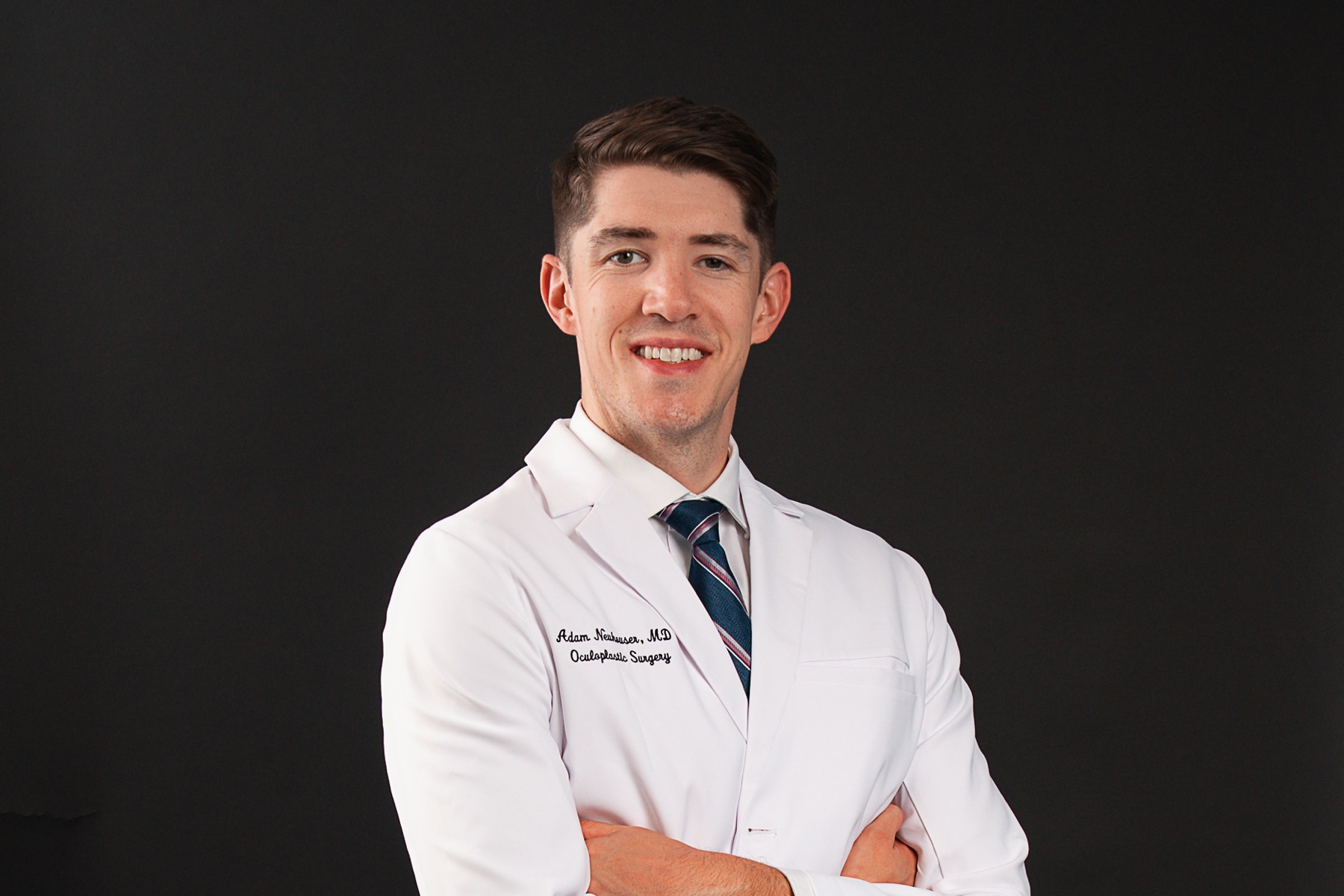 Dr. Adam Neuhouser