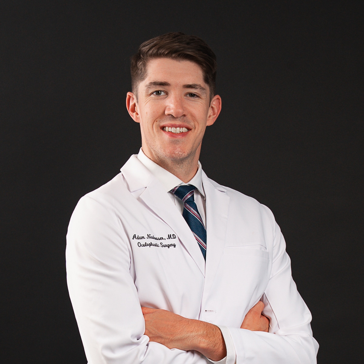 Dr. Adam Neuhouser
